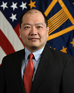 Robert E. Irie, Director, Maintaining Technology Advantage, Washington Headquarters Services, Department of Defense, poses for his official portrait in the Army portrait studio at the Pentagon in Arlington, Va., Feb., 6, 2020.  (U.S. Army photo by Monica King)